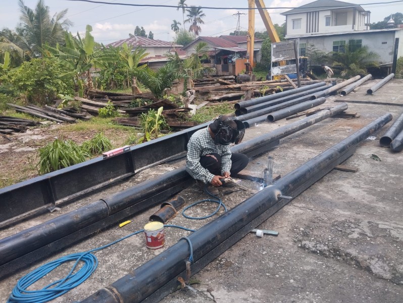 Wujudkan Konektivitas Warga, Polres Dumai Terus Kebut Pembangunan Jembatan Merah Putih Presisi Tahap II