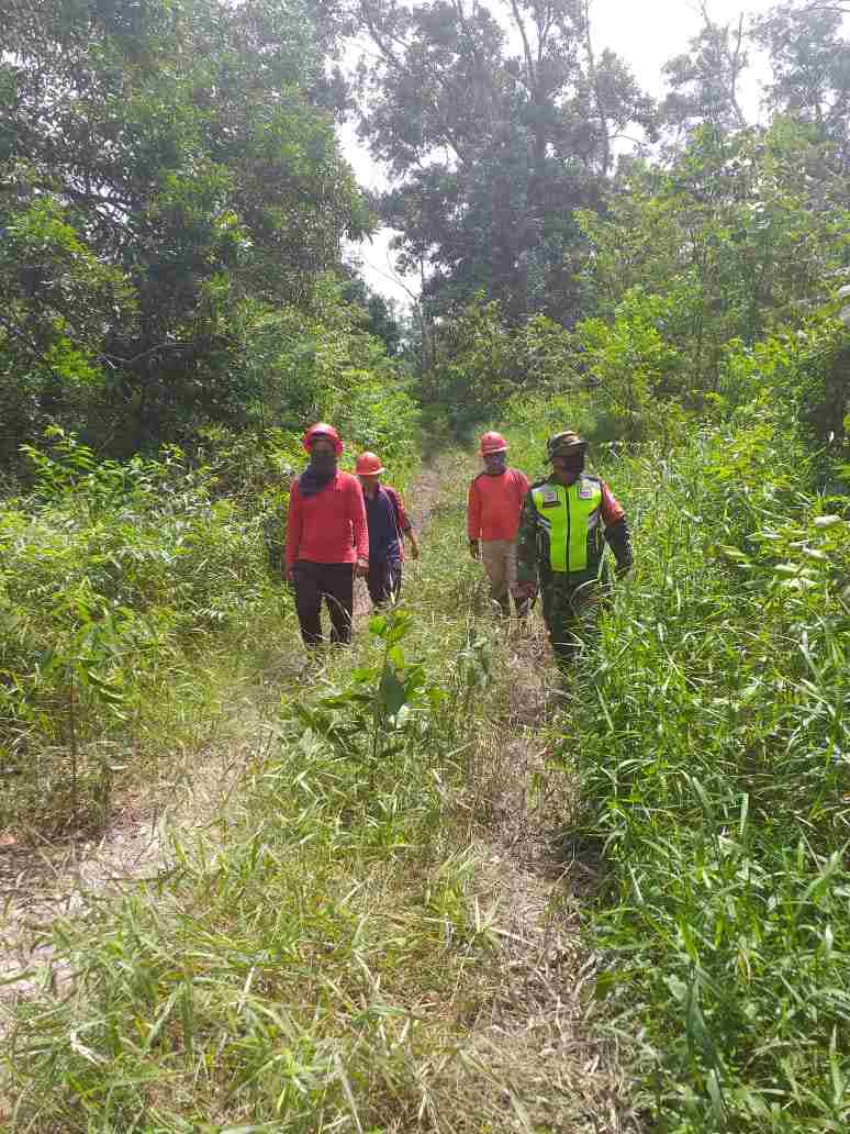 Cegah Karlahut di Desa Melibur, Serda P. Sinaga Laksanakan Patroli