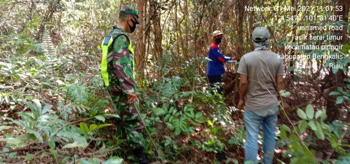 Serda M. Fikri Memantau Titik Hot Spot di wilayah Desa Tasik Serai Timur